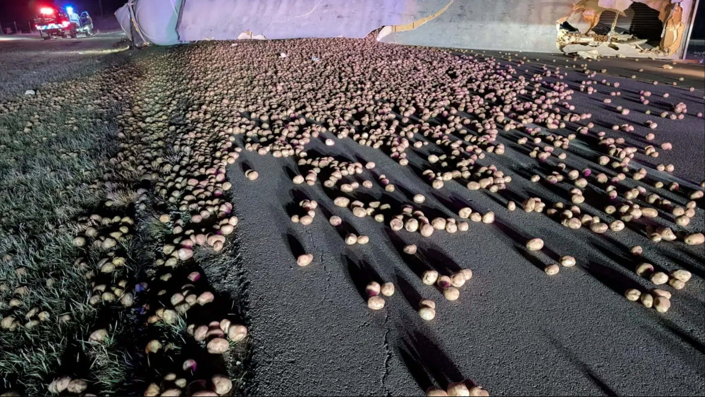 semi-truck's cargo spilled across the highway.