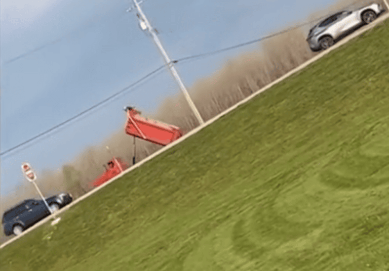 Dump Truck Driver Cursed at Every Witness Who Warned Him His Bed Was Up — Knocked Out Five Streetlights and Hit I-64 Overpass, Now Faces Five Felony Counts