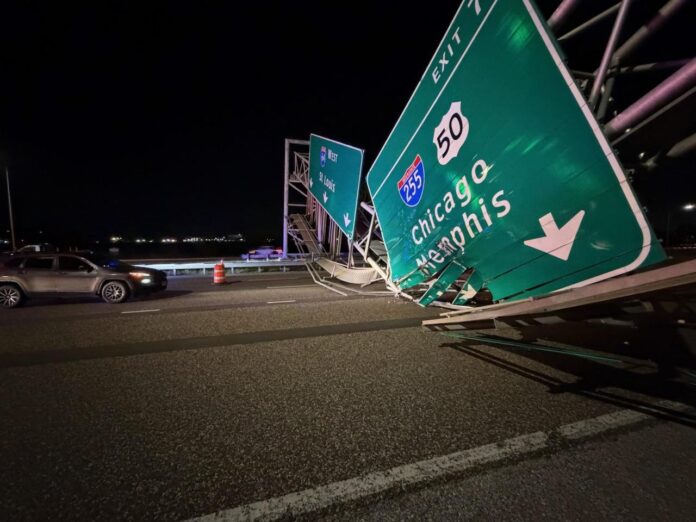 dump bed struck an overhead highway sign i