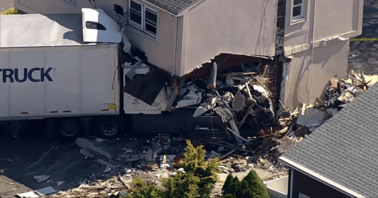 Update: Tractor-Trailer Carrying Dog Food Still Lodged in Clifton Limo Business Building a Day After Crash as Engineers Work to Prevent Building Collapse
