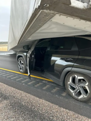 High Winds Blow Semi Onto SUV