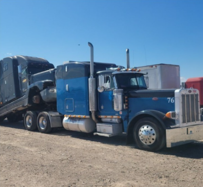 stolen vehicles that had been concealed inside tractor-trailers