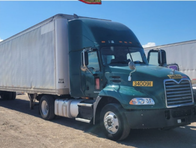 stolen vehicles that had been concealed inside tractor-trailers