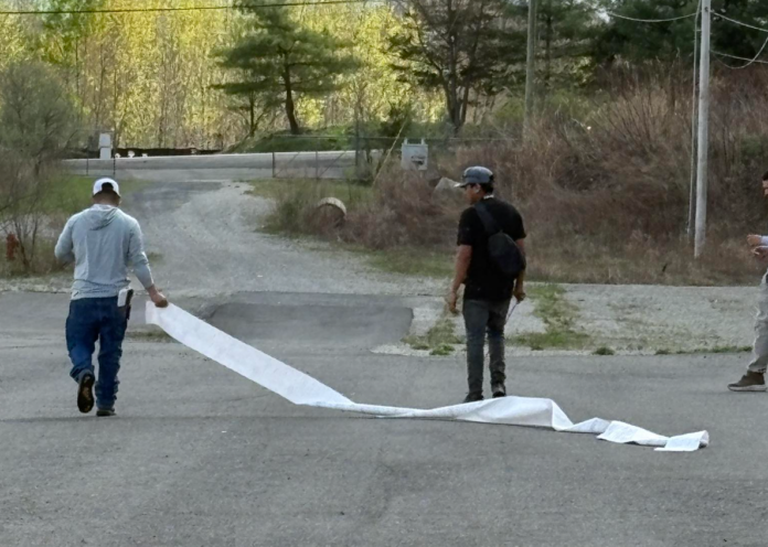 Commercial Driver Drags 20-Foot Trail of Tickets