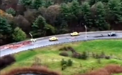 Tractor-Trailer Overturns and Spills Wood 